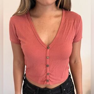 Cropped coral pink t shirt.
